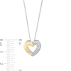 0.18 CT. T.W. Diamond Half-and-Half Heart Outline Pendant in Sterling Silver and 10K Gold