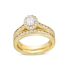 Thumbnail Image 0 of GIA-Graded Oval Centre Diamond 1.10 CT. T.W. Frame Vintage-Style Bridal Set in 14K Gold (F/SI2)