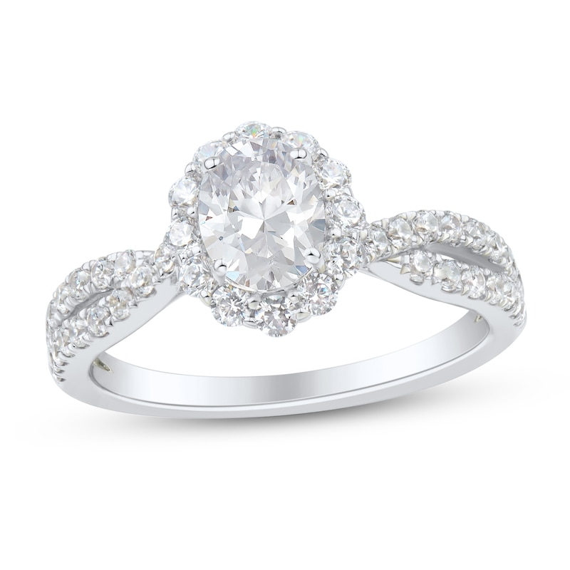 1.29 CT. T.W. Oval Diamond Flower Frame Twist Shank Engagement Ring in 14K White Gold|Peoples Jewellers