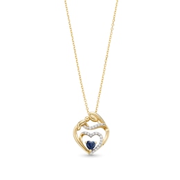 4.0mm Heart-Shaped Blue Sapphire and 0.085 CT. T.W. Diamond Motherly Love Heart Pendant in 10K Gold
