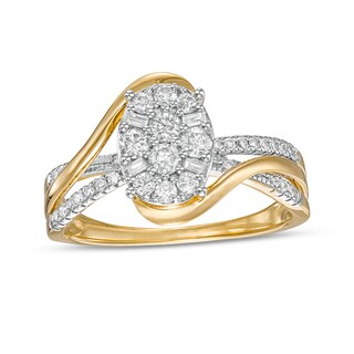 Previously Owned - 0.50 CT. T.W. Composite Oval Diamond Crossover Split Shank Ring in 10K Gold