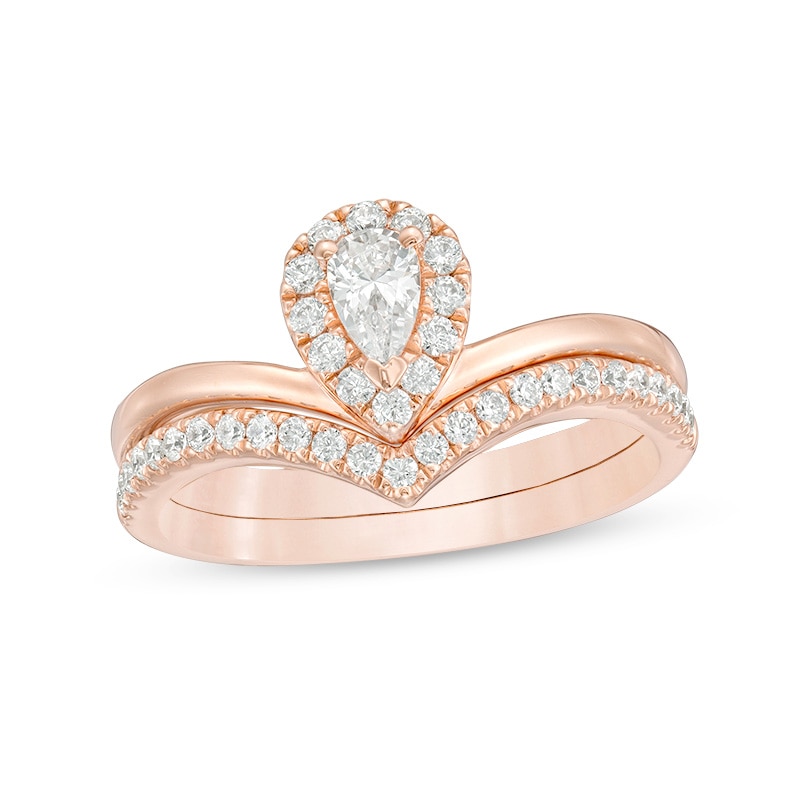 Previously Owned - 0.50 CT. T.W. Pear-Shaped Diamond Frame Chevron Bridal Set in 14K Rose Gold|Peoples Jewellers