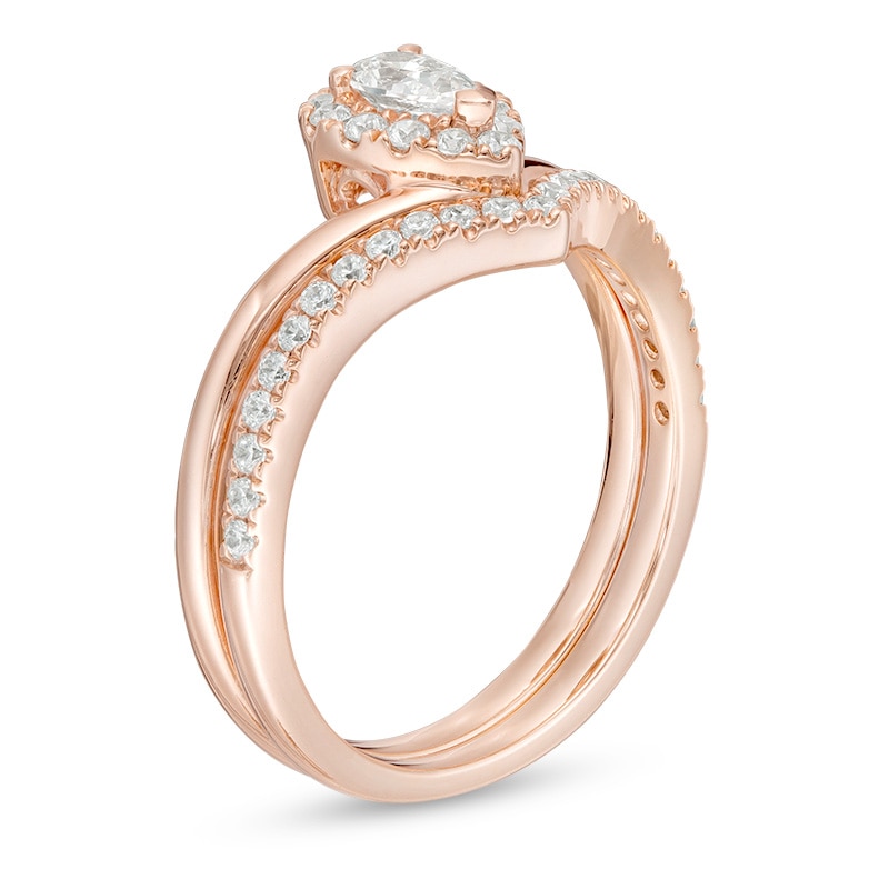Previously Owned - 0.50 CT. T.W. Pear-Shaped Diamond Frame Chevron Bridal Set in 14K Rose Gold|Peoples Jewellers