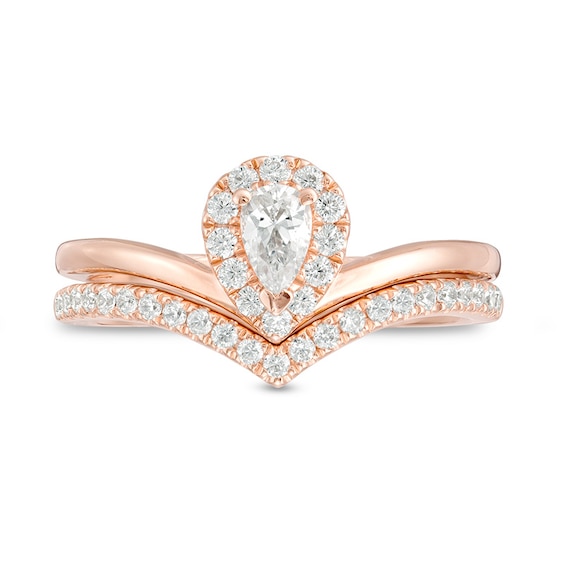 Previously Owned - 0.50 CT. T.W. Pear-Shaped Diamond Frame Chevron Bridal Set in 14K Rose Gold