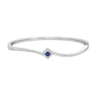 Previously Owned - Vera Wang Love Collection Blue Sapphire and 0.18 CT. T.W. Diamond Bypass Bangle in Sterling Silver