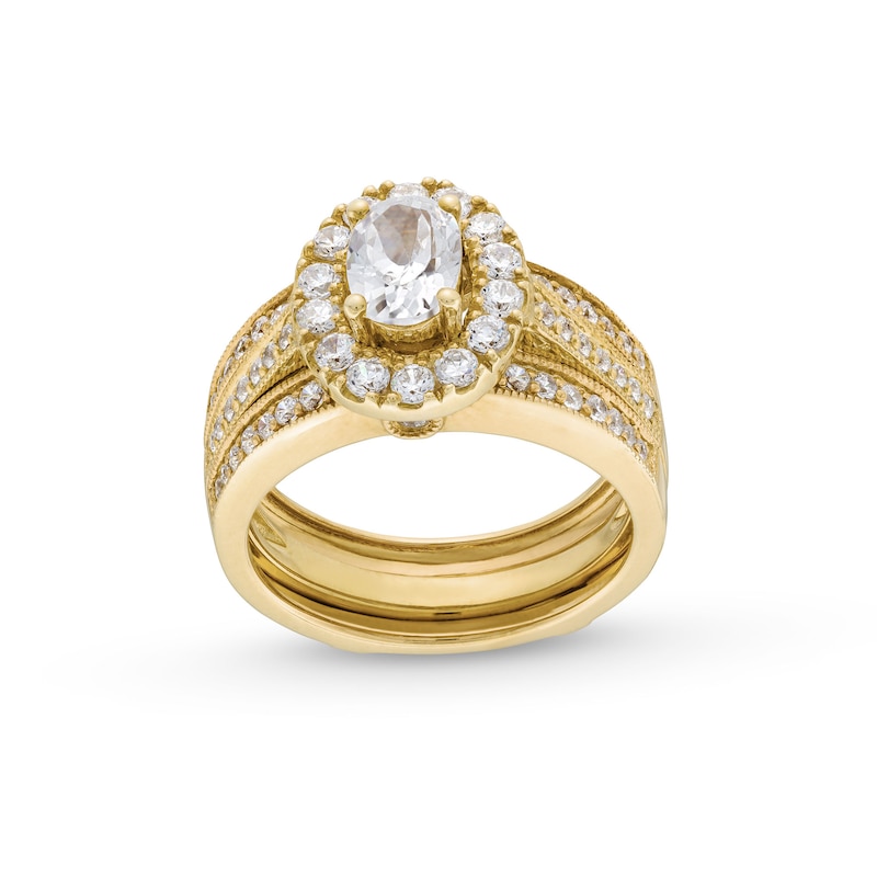 2.00 CT. T.W. Oval Certified Lab-Created Diamond Frame Vintage-Style Bridal Set in 14K Gold (F/VS2)