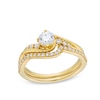 Thumbnail Image 0 of 0.75 CT. T.W. Diamond Swirl Bypass Shank Bridal Set in 10K Gold