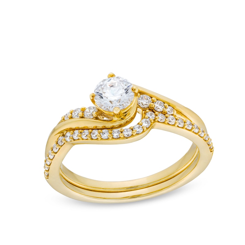 0.75 CT. T.W. Diamond Swirl Bypass Shank Bridal Set in 10K Gold