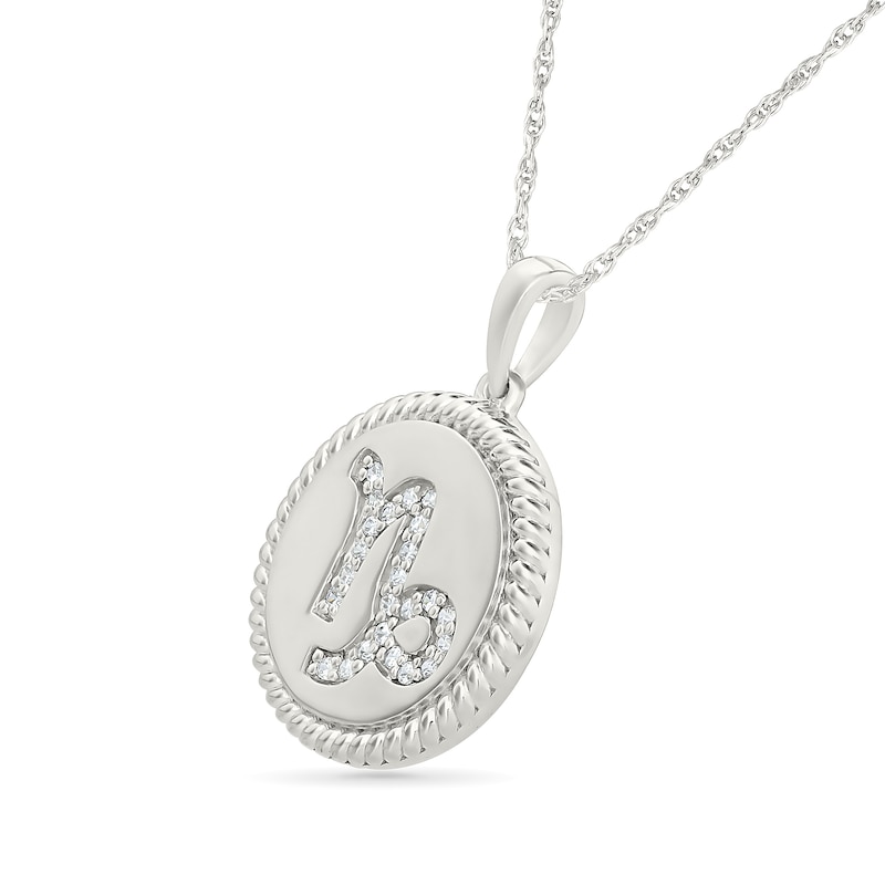 0.085 CT. T.W. Diamond Capricorn Zodiac Sign Rope-Textured Frame Disc Pendant in Sterling Silver