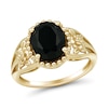 Oval Onyx Solitaire Flower Shank Ring in 10K Gold