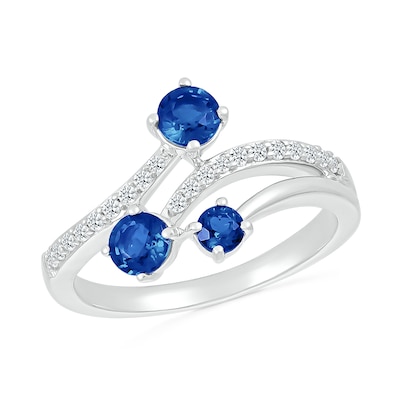 Blue and White Lab-Created Sapphire Three Stone Bypass Split Shank Ring in Sterling Silver