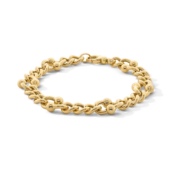 Italian Gold 12.0mm Stirrup Link Bracelet in Hollow 18K Gold - 7.5"