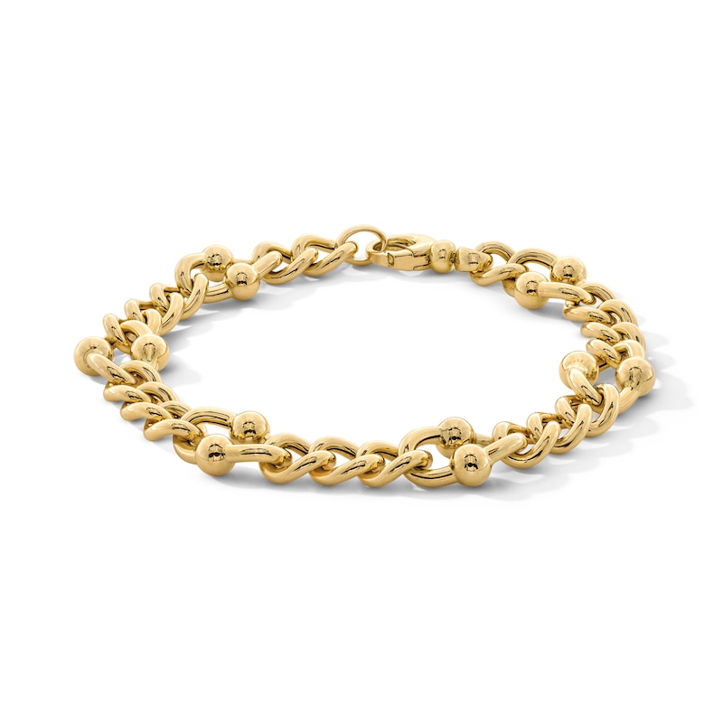 Italian Gold 12.0mm Stirrup Link Bracelet in Hollow 18K Gold - 7.5"