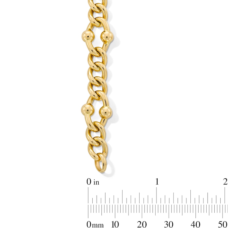 Italian Gold 12.0mm Stirrup Link Bracelet in Hollow 18K Gold - 7.5"