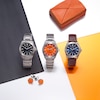 Men’s Citizen Eco-Drive® Brycen Weekender Super Titanium™ Watch with Orange Dial (Model: AW1840-50X)