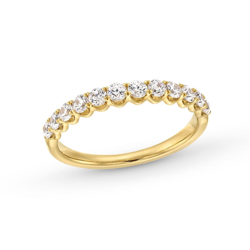 0.60 CT. T.W. Diamond Twelve Stone Scallop Edge Anniversary Band in 10K Gold