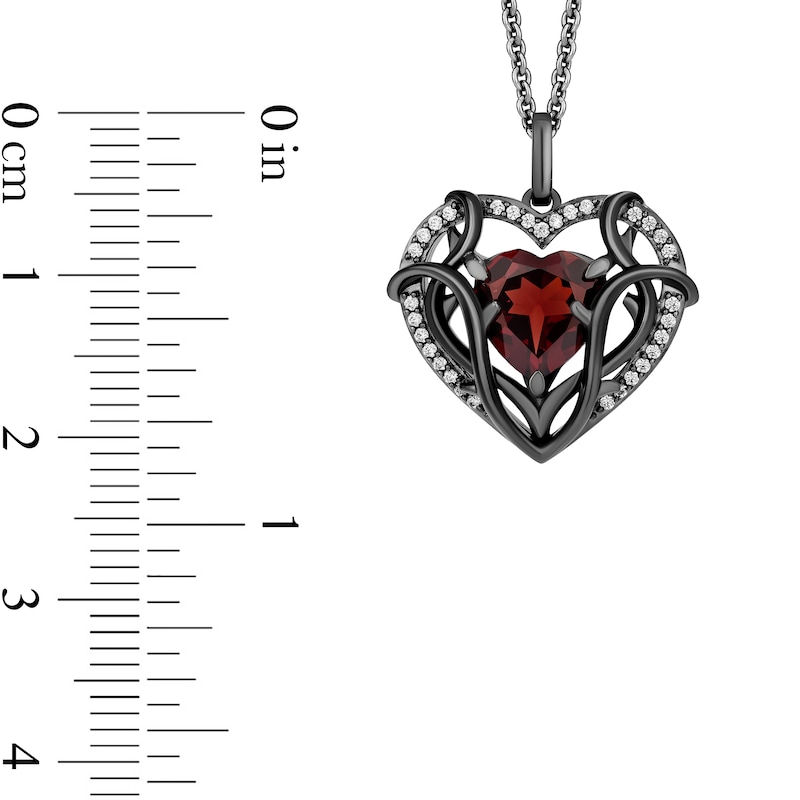 Enchanted Disney Villains Evil Queen Heart-Shaped Garnet and 0.115 CT. T.W. Diamond Frame Pendant in Sterling Silver