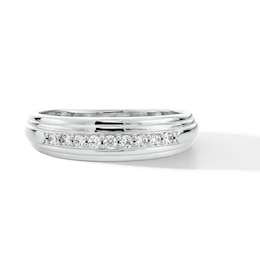 0.20 CT. T.W. Diamond Graduated Nine Stone Stepped Edge Anniversary Band in 10K White Gold