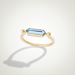 Limor Elongated Hexagon Swiss Blue Topaz Sideways Solitaire Stackable Ring in 10K Gold