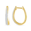 0.23 CT. T.W. Diamond Oval Hoop Earrings in 10K Gold