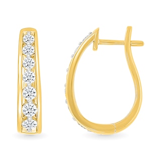 0.95 CT. T.W. Diamond Graduated Oval Hoop Earrings in 10K Gold