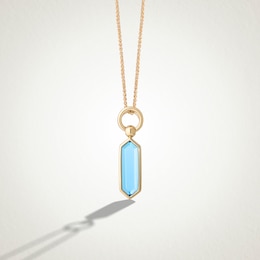 Limor Elongated Hexagon Swiss Blue Topaz Solitaire Drop Pendant in 10K Gold