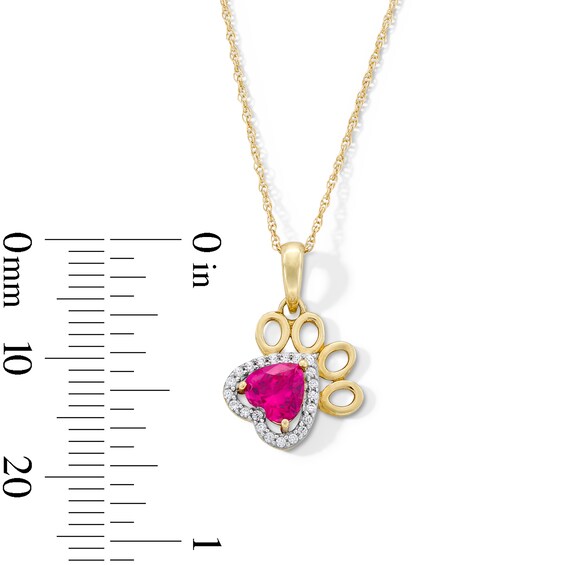 5.0mm Heart-Shaped Lab-Created Ruby and 0.05 CT. T.W. Diamond Frame Paw Print Pendant in 10K Gold