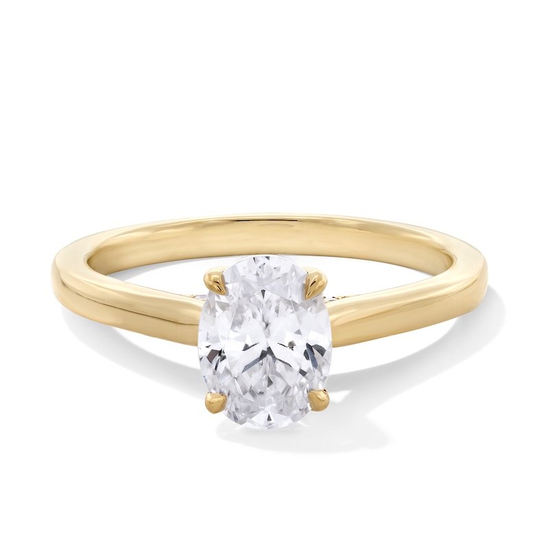 1.06 CT. T.W. Oval Canadian Certified Centre Diamond Solitaire Engagement Ring in 18K Gold (I/SI2)