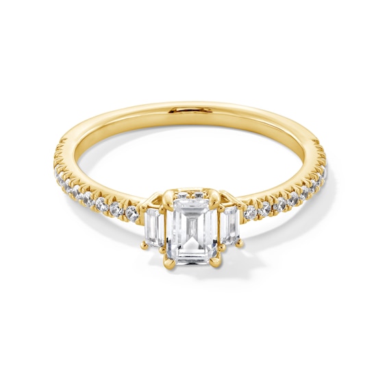 0.69 CT. T.W. Emerald-Cut Canadian Certified Centre Diamond Three Stone Engagement Ring in 14K Gold (I/SI2)