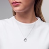 Unstoppable Love™ 0.10 CT. T.W. Black and White Diamond Tilted Heart Pendant in Sterling Silver