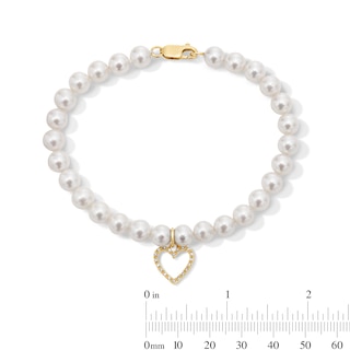 6.0-7.0mm Freshwater Cultured Pearl and 0.085 CT. T.W. Diamond Heart Charm Bracelet in 10K Gold - 8”