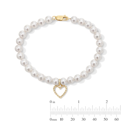 6.0-7.0mm Freshwater Cultured Pearl and 0.085 CT. T.W. Diamond Heart Charm Bracelet in 10K Gold - 8”