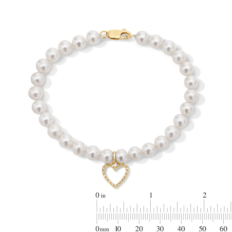 6.0-7.0mm Freshwater Cultured Pearl and 0.085 CT. T.W. Diamond Heart Charm Bracelet in 10K Gold - 8”