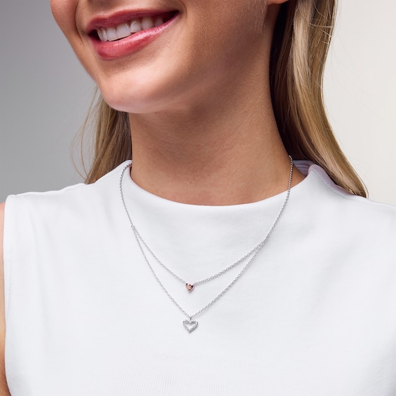 0.085 CT. T.W. Diamond Layered Double Heart Necklace in Sterling Silver and 18K Rose Gold Plate - 19”