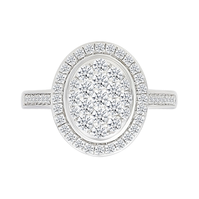 0.95 CT. T.W. Oval-Shaped Multi-Diamond Frame Bridal Set in 10K Gold