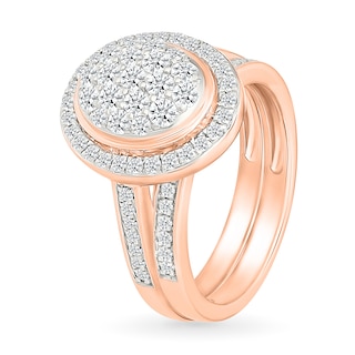 0.95 CT. T.W. Oval-Shaped Multi-Diamond Frame Bridal Set in 10K Rose Gold