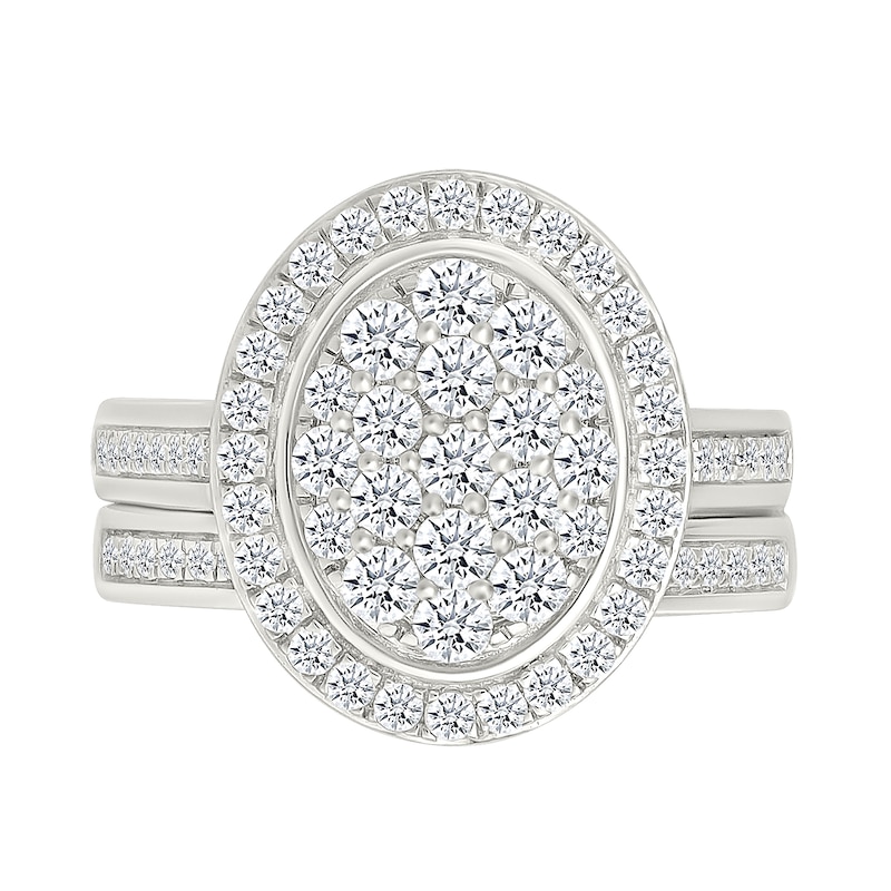 1.23 CT. T.W. Oval-Shaped Multi-Diamond Bezel Frame Bridal Set in 10K Gold