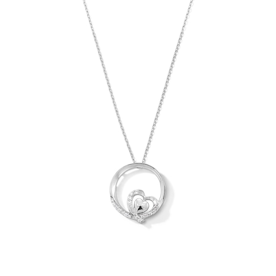 0.10 CT. T.W. Diamond Heart Circle Pendant in Sterling Silver