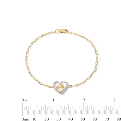 0.085 CT. T.W. Diamond Motherly Love Heart Bracelet in 10K Gold - 7.25"