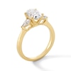 1.80 CT. T.W. Oval and Pear-Shaped Certified Lab-Created Diamond Three Stone Engagement Ring in 14K Gold (F/VS2)