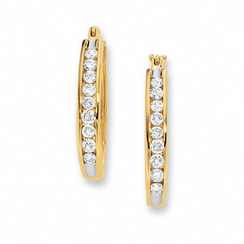 Previously Owned - 0.50 CT. T.W. Channel-Set Diamond Oval Hoop Earrings in 10K Gold|Peoples Jewellers