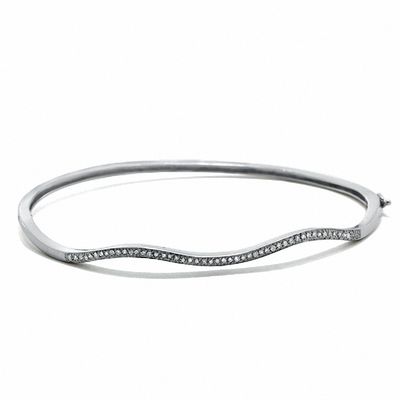 Previously Owned - 0.15 CT. T.W. Diamond Wavy Bangle in Sterling Silver