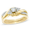 Previously Owned - 0.33 CT. T.W. Diamond Braid Bridal Set in 10K Gold