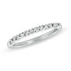 Thumbnail Image 0 of Previously Owned - 0.10 CT. T.W. Diamond Wavy Anniversary Band in 10K White Gold