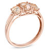 Thumbnail Image 1 of Previously Owned - Oval Morganite and Diamond Accent Three Stone Ring in 10K Rose Gold