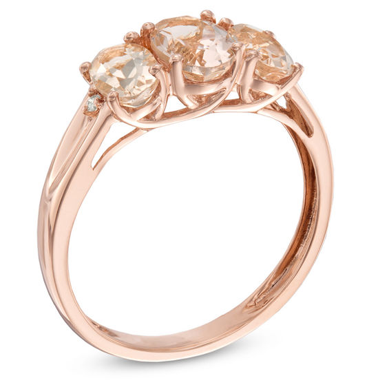 Previously Owned - Oval Morganite and Diamond Accent Three Stone Ring in 10K Rose Gold