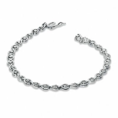 Previously Owned - 0.10 CT. T.W. Diamond Open Teardrop Link Bracelet in Sterling Silver