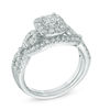 Previously Owned - 0.95 CT. T.W. Princess-Cut Diamond Frame Twist Bridal Set in 14K White Gold