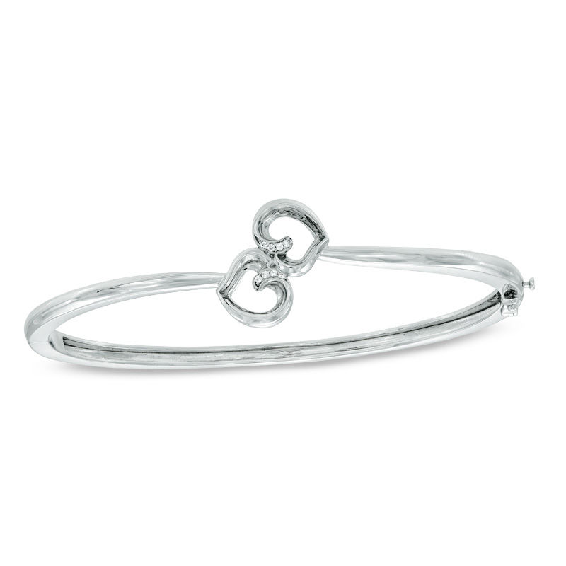 Previously Owned -  Diamond Accent Embracing Hearts Bangle in Sterling Silver