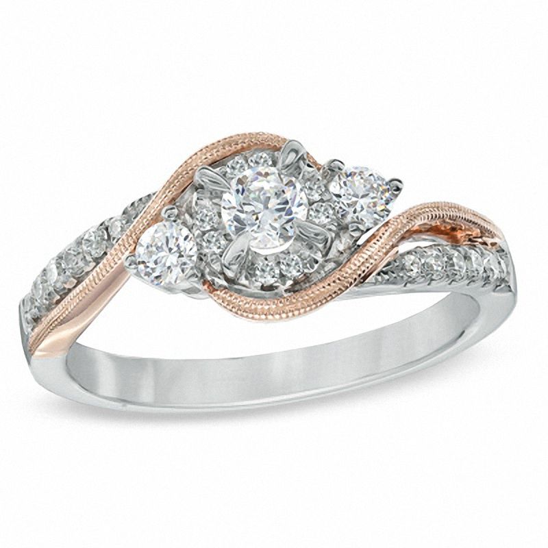 Previously Owned - 0.50 CT. T.W. Diamond Three Stone Swirl Engagement Ring in 10K Two-Tone Gold|Peoples Jewellers